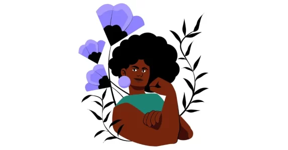 mulher preta com o braço dobrado e a mão para cima, para representar sua força, cercada por flores lilás para representar sua sensibilidade e a luta do feminino